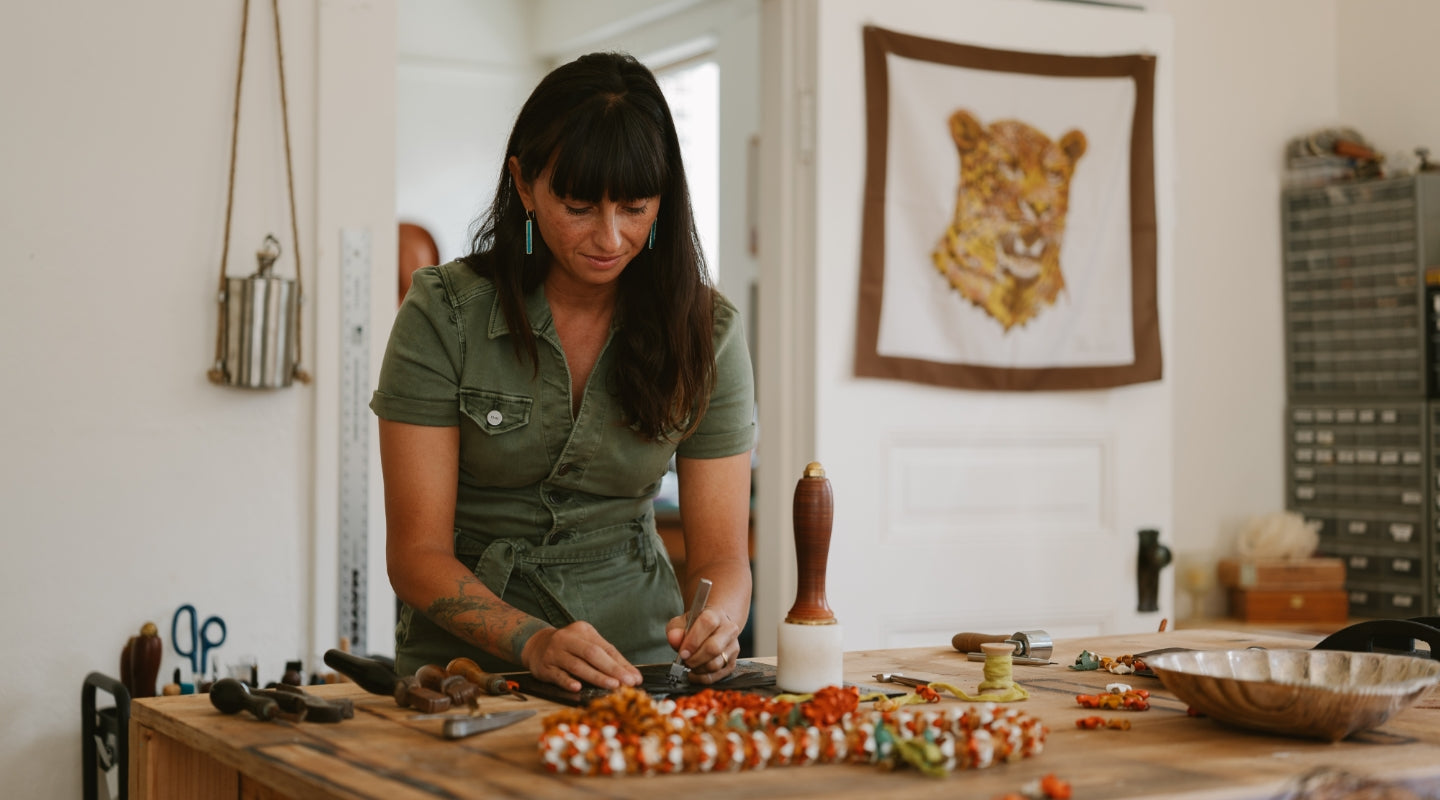 Desktop image -  master leathermaker Sam Hook, founder of Tidal Theory, a boutique leather goods and storefront in Honolulu's Chinatown
